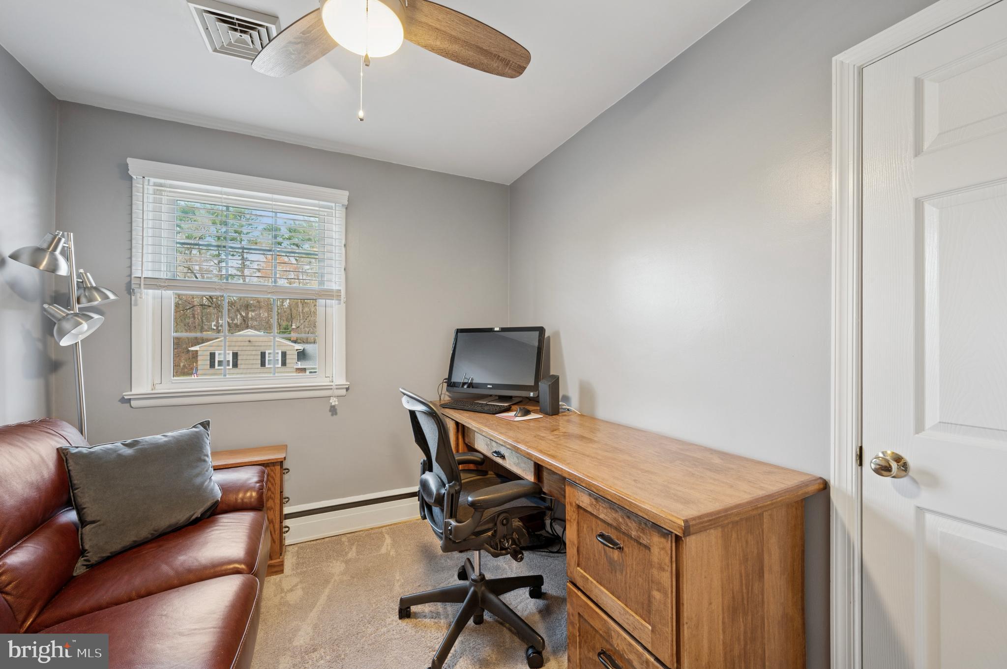 946 Georgetown Road Swarthmore, PA 19081 - Photo 30 of 36 a workspace with furniture and a window