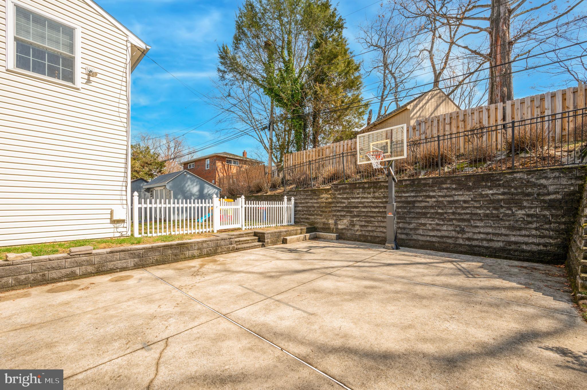 946 Georgetown Road Swarthmore, PA 19081 - Photo 34 of 36 a view of a house with a snow in the yard