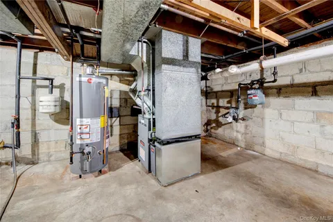 a view of a storage room with table and chairs
