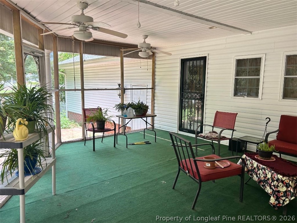 3085 Westminster Road Lumberton, NC 28360 - Photo 14 of 19 a swimming pool with outdoor seating and yard