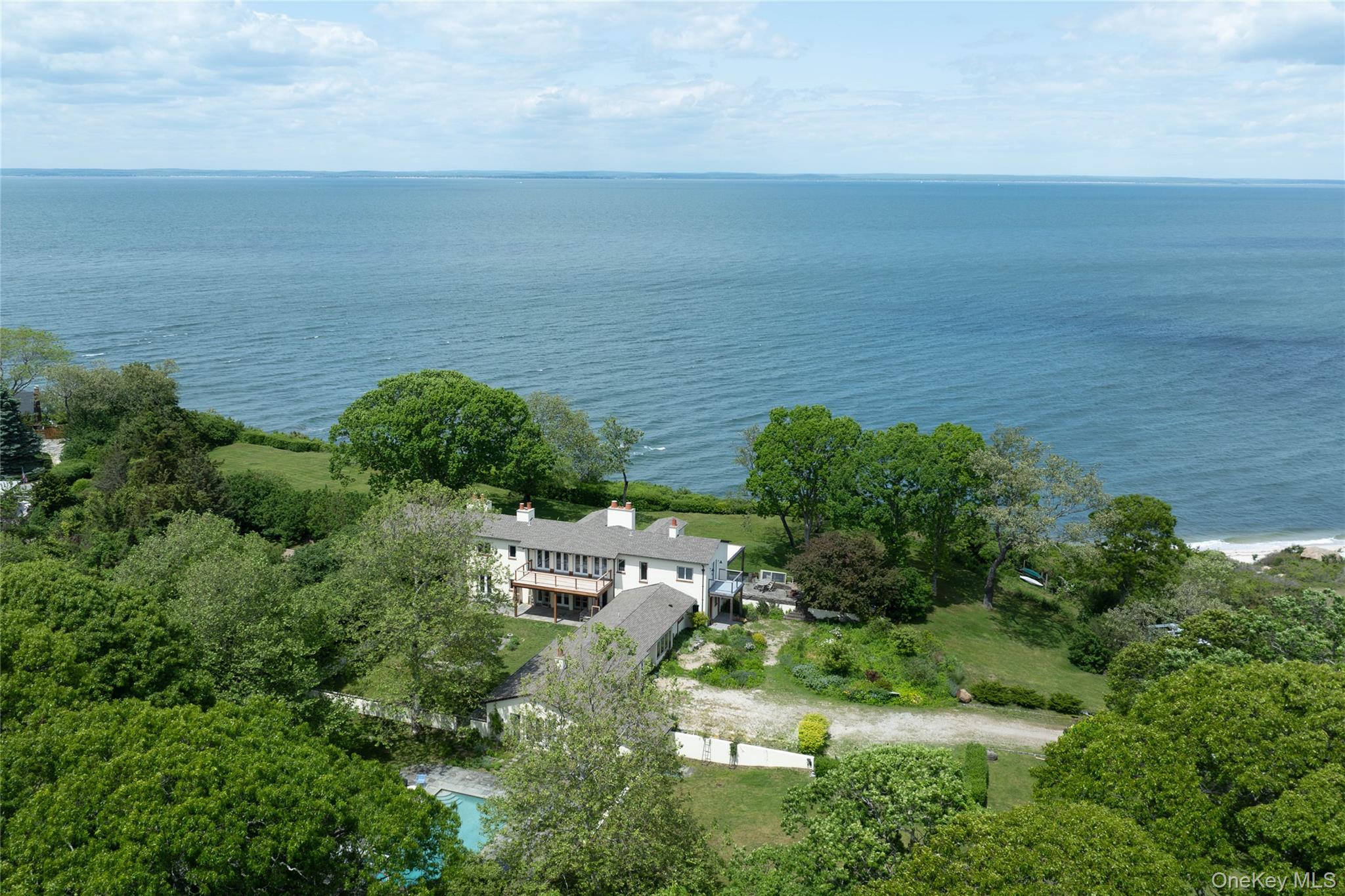 2840 Stars Road East Marion, NY 11939 - Photo 42 of 43 an aerial view of ocean and residential houses with outdoor space