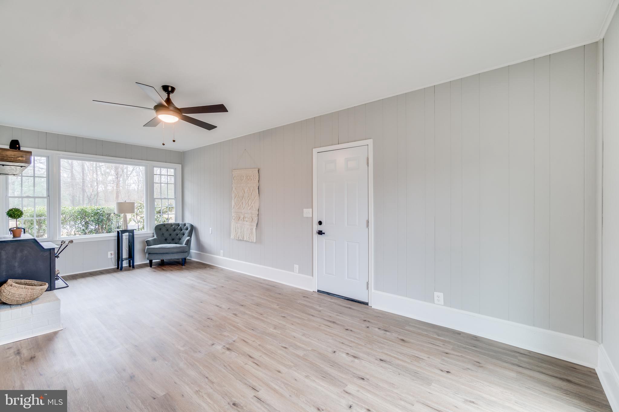 9035 Dahlgren Road King George, VA 22485 - Photo 19 of 38 Sitting area with wood fire place