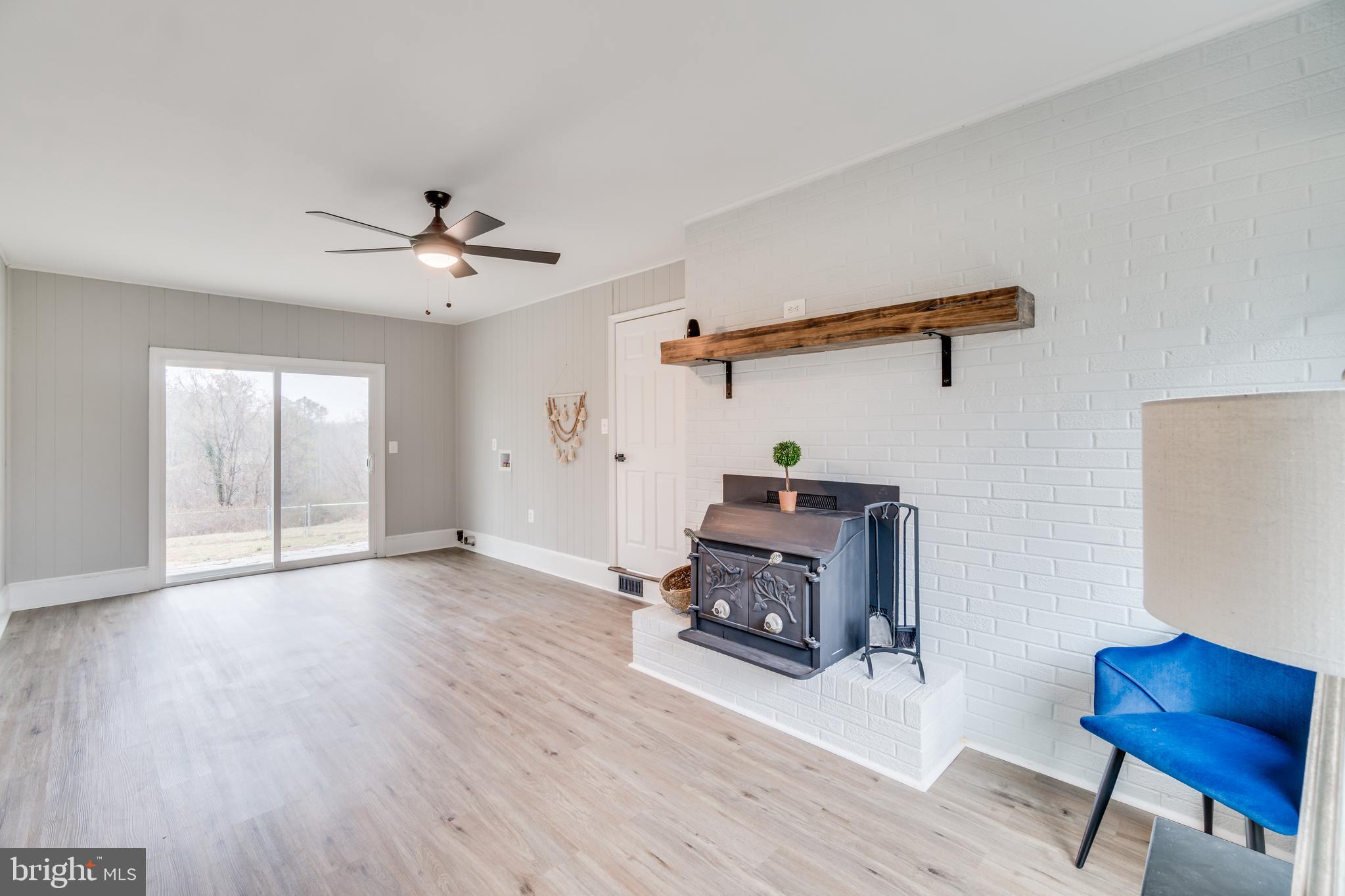 9035 Dahlgren Road King George, VA 22485 - Photo 21 of 38 Sliding glass doors walk out to rock patio