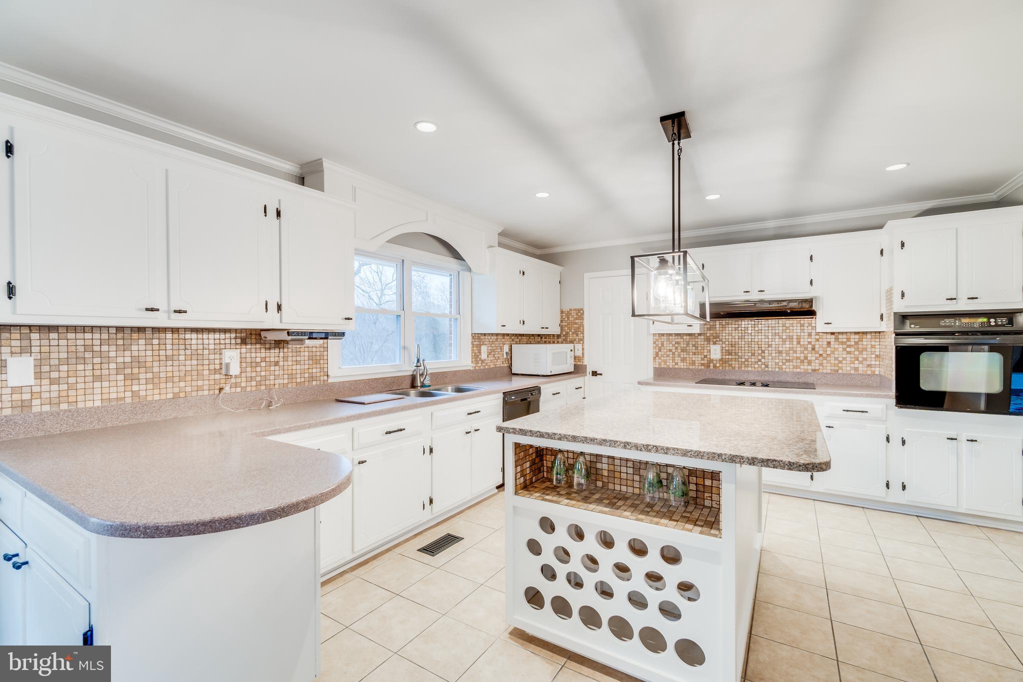 9035 Dahlgren Road King George, VA 22485 - Photo 5 of 38 Island with custom wine rack