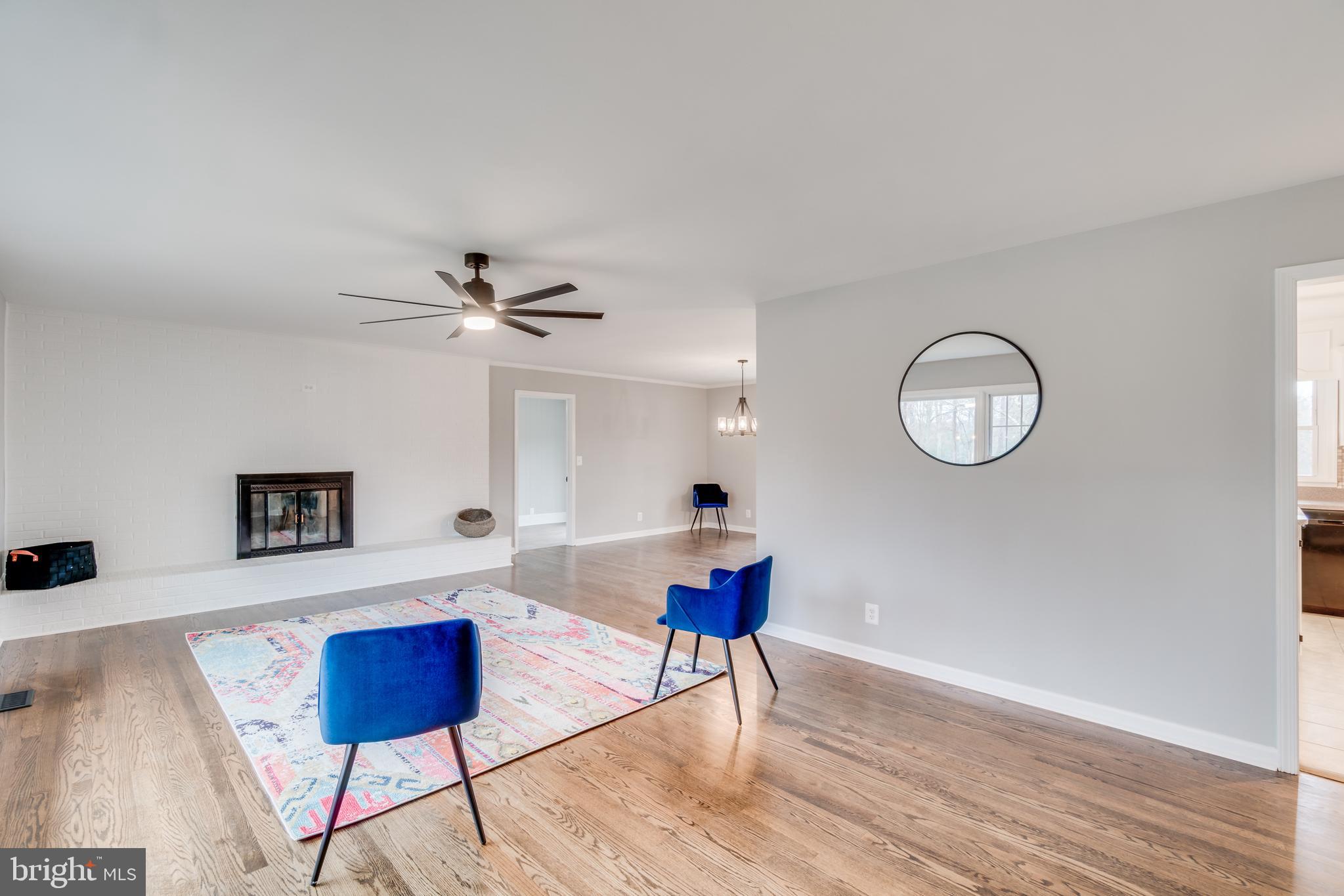 9035 Dahlgren Road King George, VA 22485 - Photo 9 of 38 Family room with wood fireplace