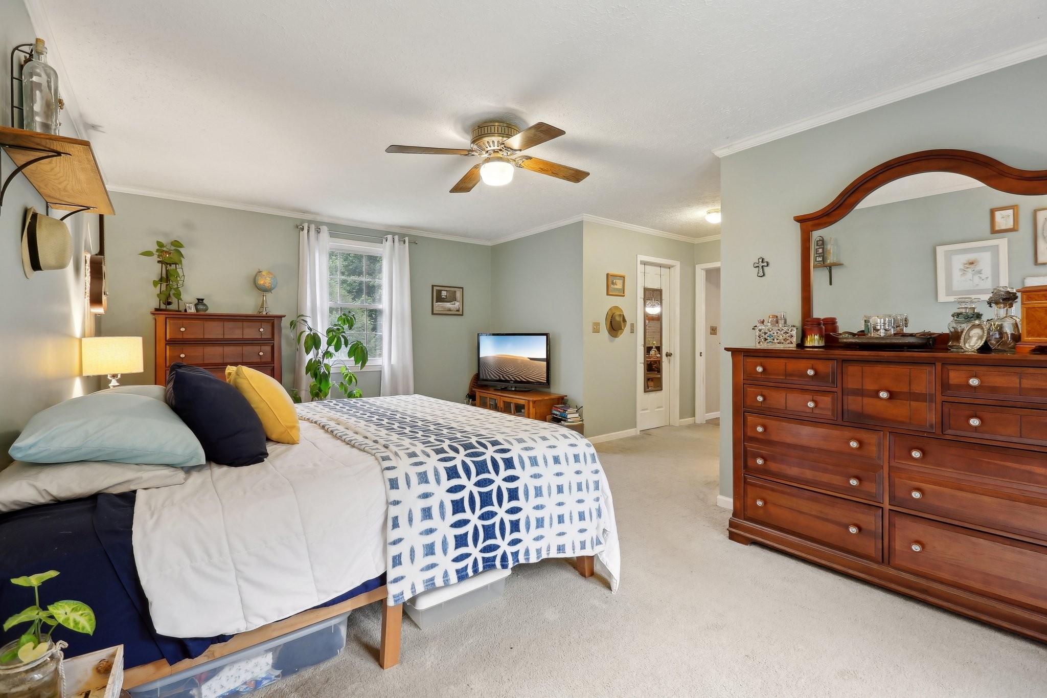 401 Harper Road Clarksville, TN 37043 - Photo 39 of 79 a bedroom with a bed and wooden floor
