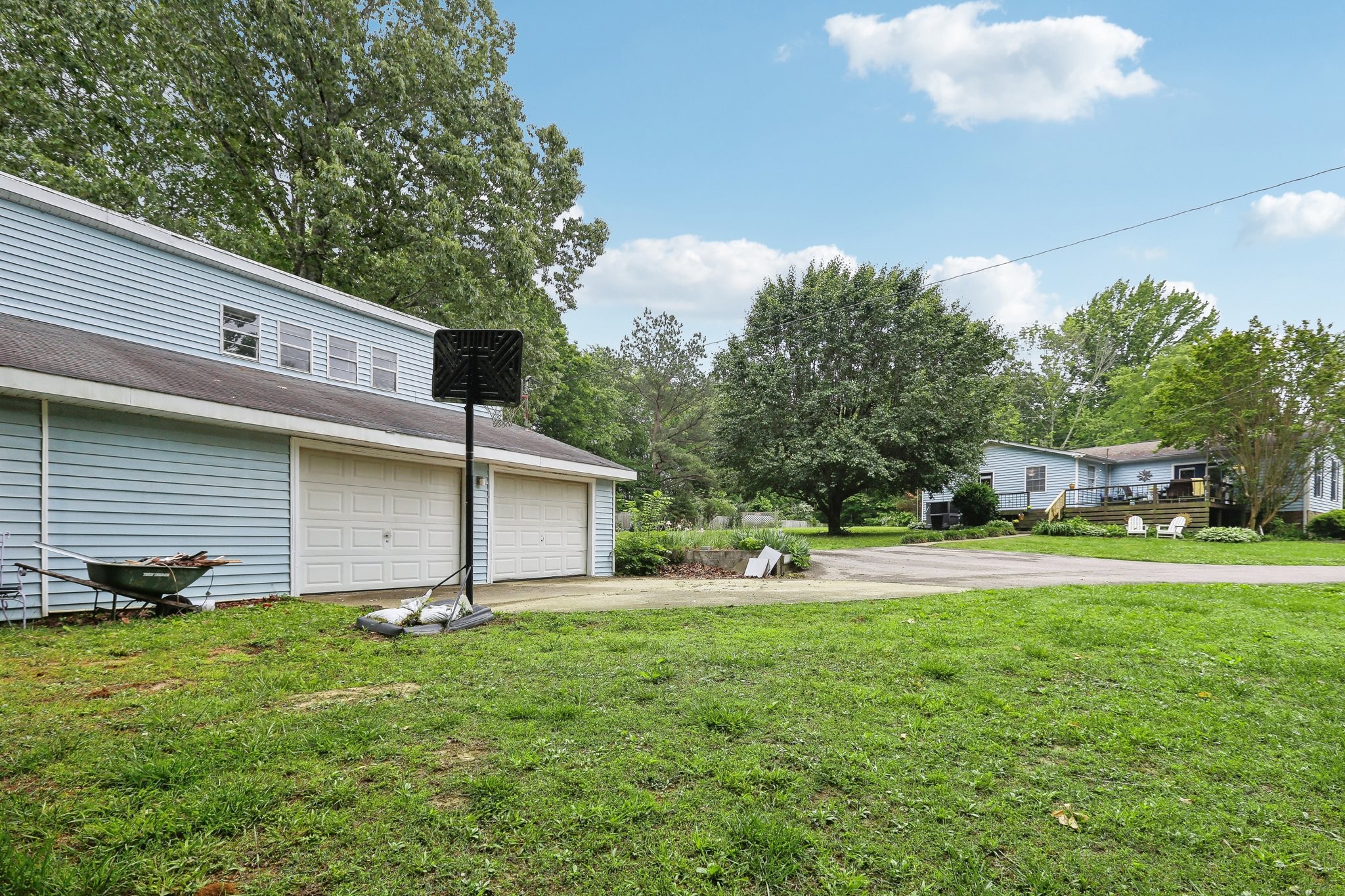 401 Harper Road Clarksville, TN 37043 - Photo 48 of 79 a view of a house with a yard and a large tree