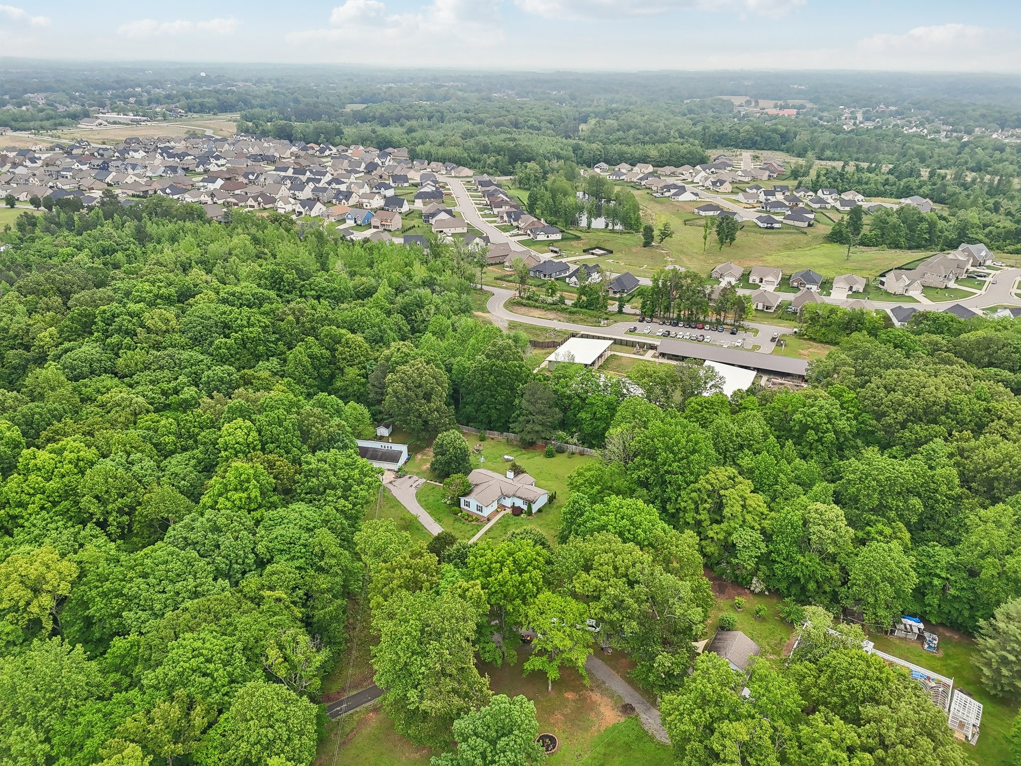 401 Harper Road Clarksville, TN 37043 - Photo 75 of 79 an aerial view of residential houses with outdoor space and trees