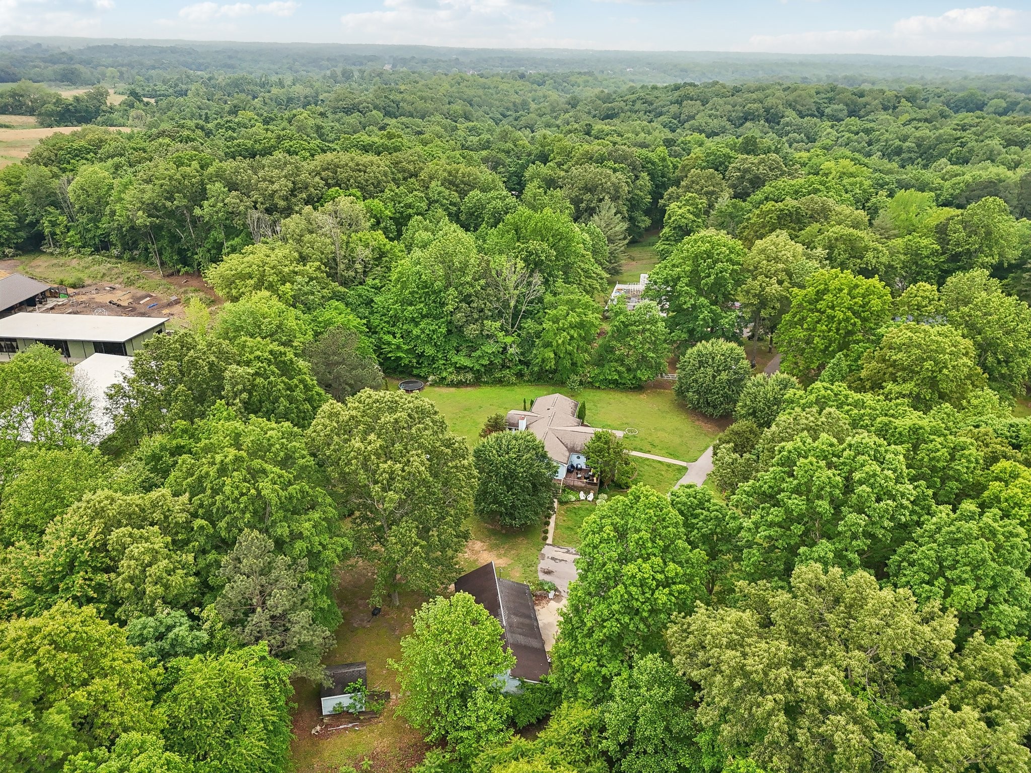 401 Harper Road Clarksville, TN 37043 - Photo 77 of 79 an aerial view of residential house with outdoor space and trees all around