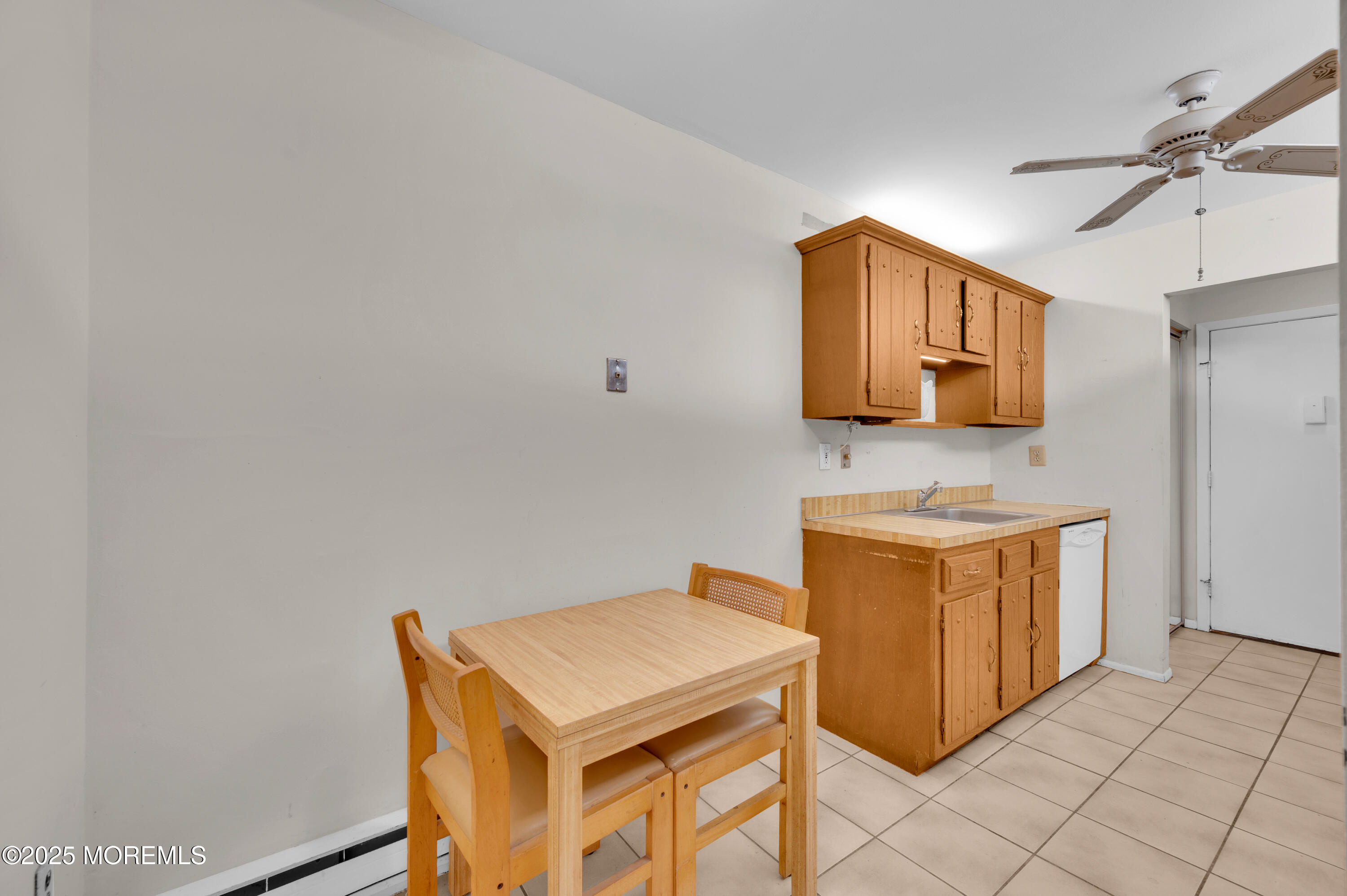 97 Arrowood Road, Unit A Englishtown, NJ 07726 - Photo 15 of 28 a room with a storage and utility