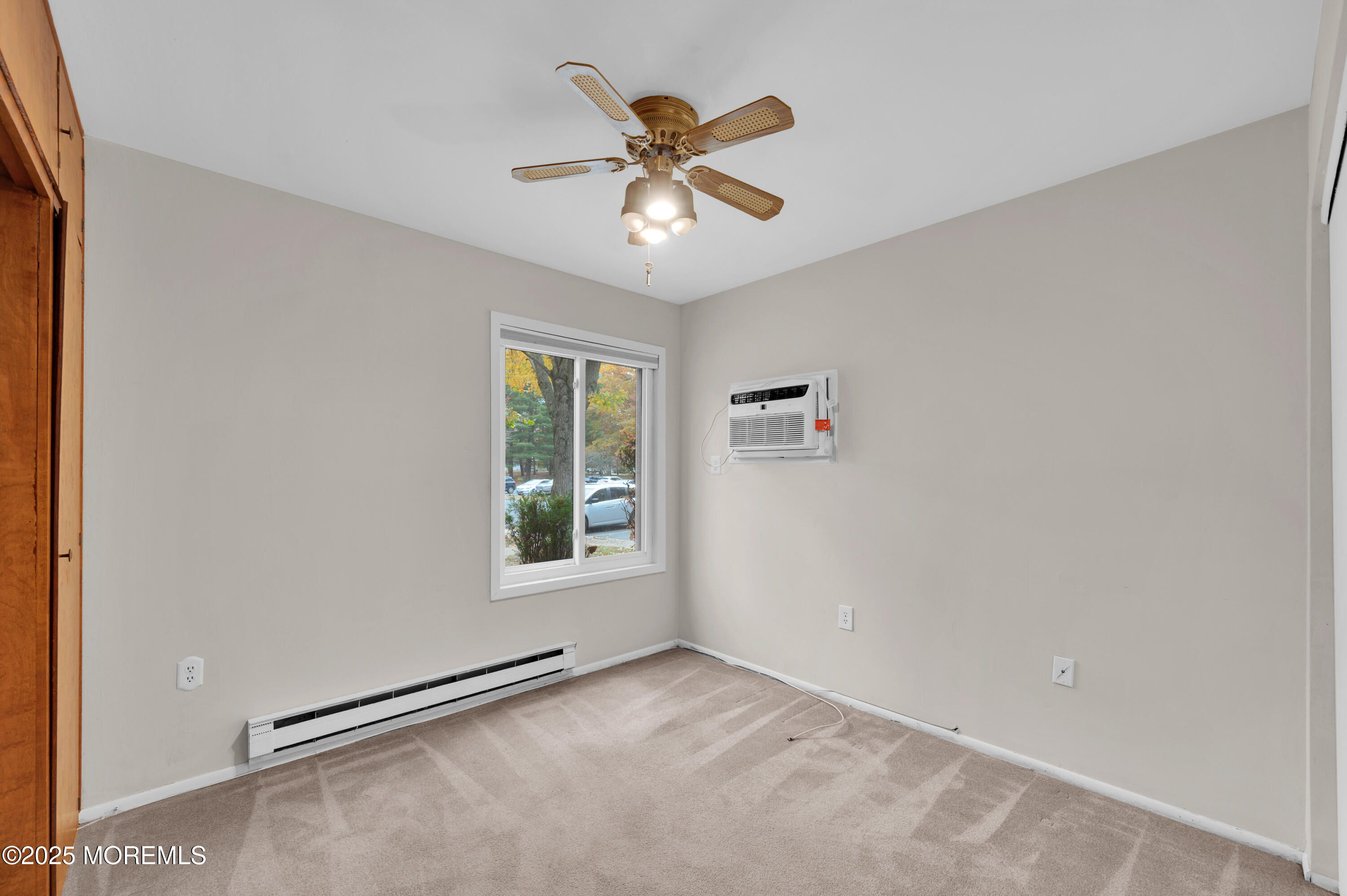 97 Arrowood Road, Unit A Englishtown, NJ 07726 - Photo 19 of 28 a view of an empty room with a window
