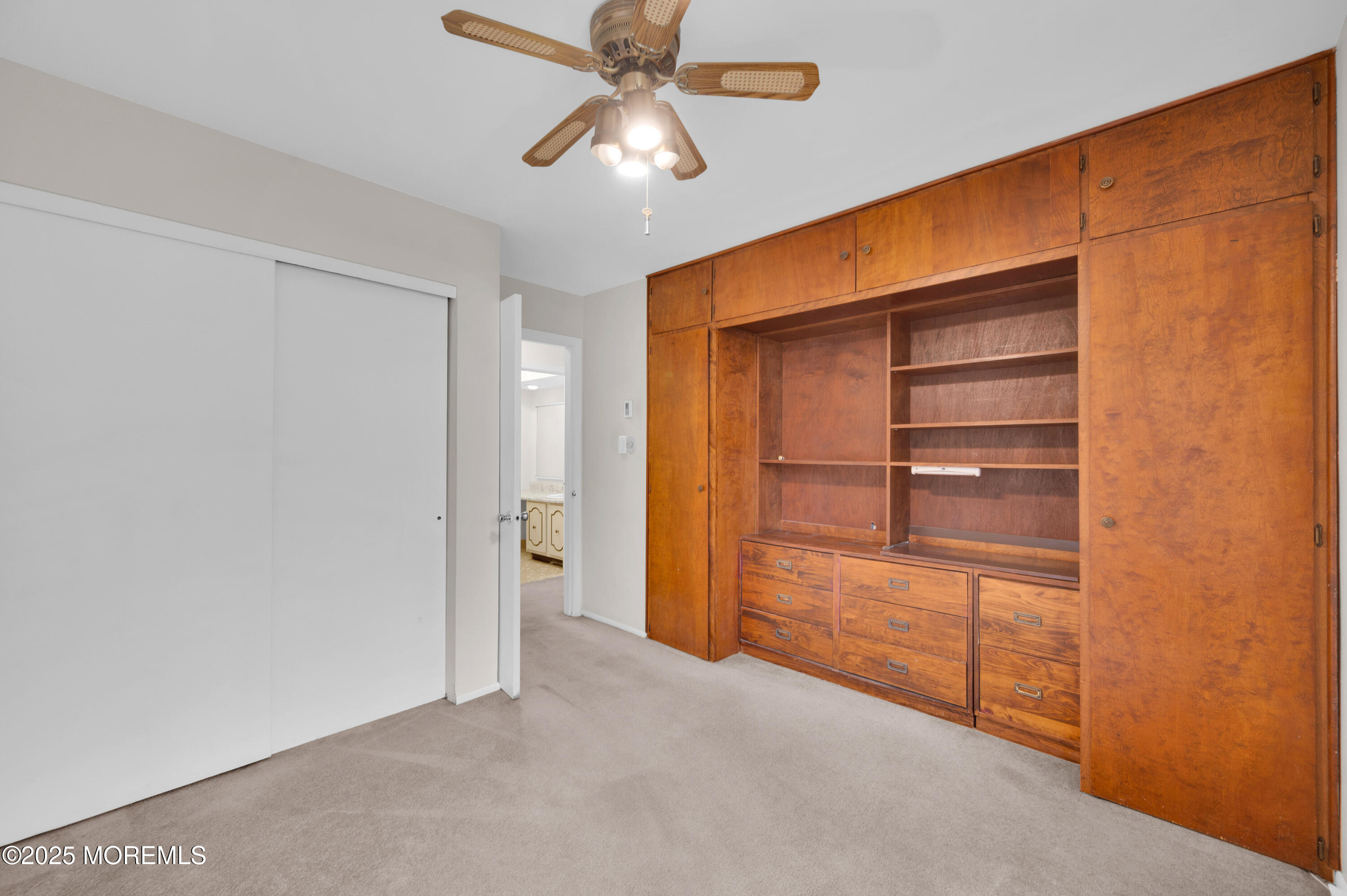 97 Arrowood Road, Unit A Englishtown, NJ 07726 - Photo 20 of 28 a view of an empty room and a ceiling fan