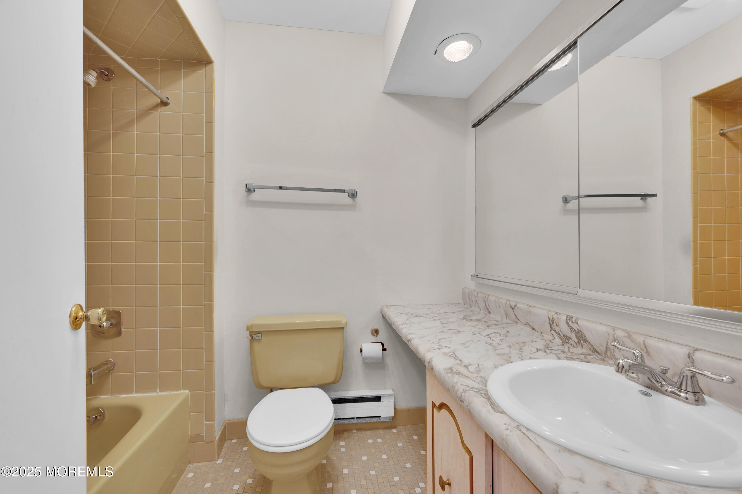 97 Arrowood Road, Unit A Englishtown, NJ 07726 - Photo 21 of 28 a bathroom with a granite countertop sink a toilet and shower