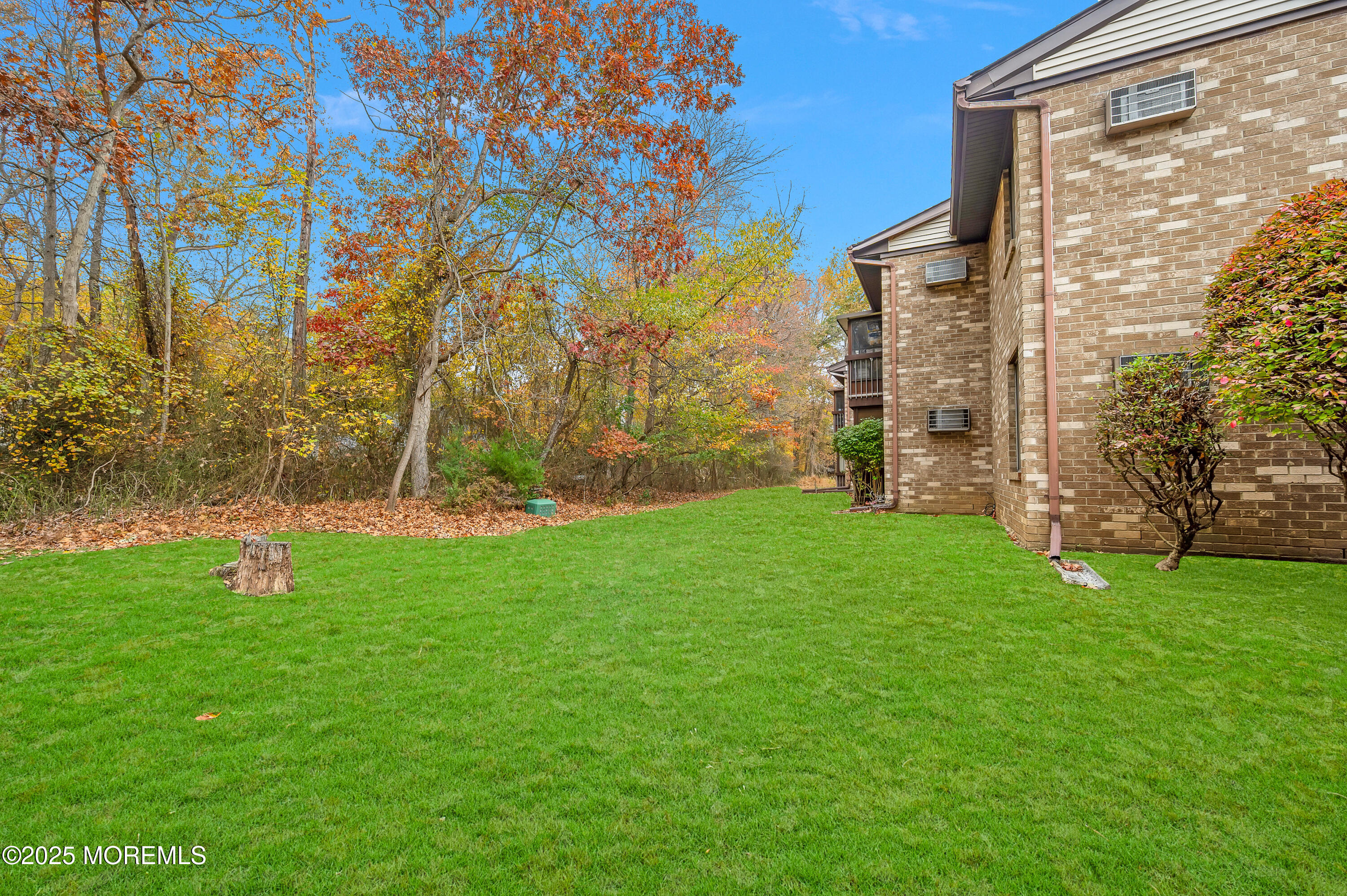 97 Arrowood Road, Unit A Englishtown, NJ 07726 - Photo 26 of 28 a view of a back yard