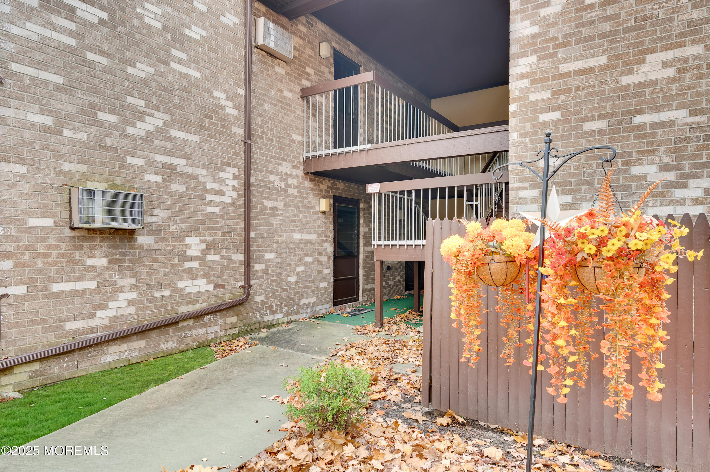 97 Arrowood Road, Unit A Englishtown, NJ 07726 - Photo 5 of 28 a front view of a house with a yard