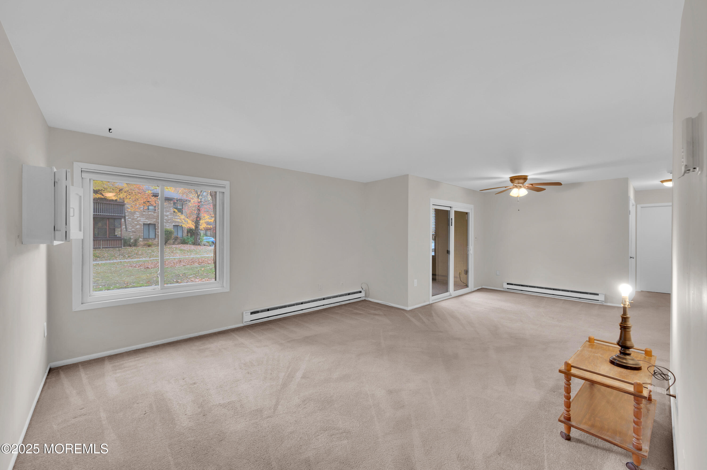 97 Arrowood Road, Unit A Englishtown, NJ 07726 - Photo 6 of 28 a view of a room with window and cabinet