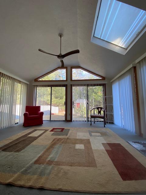 5 Barbary Circle Mashpee, MA 02649 - Photo 12 of 24 a spacious bedroom with a large bed and large windows