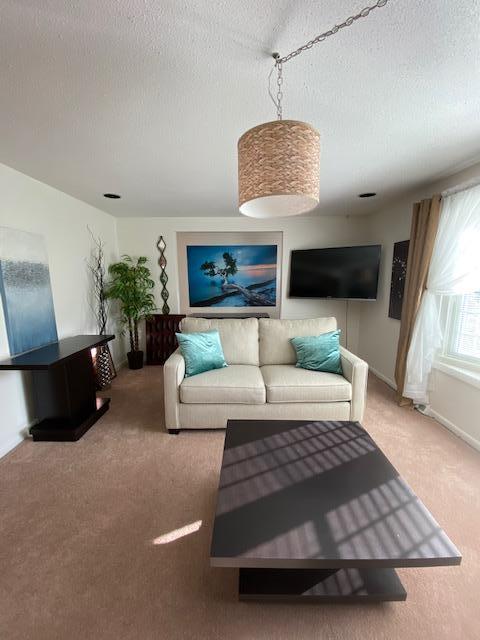 5 Barbary Circle Mashpee, MA 02649 - Photo 14 of 24 a living room with furniture and a wooden floor