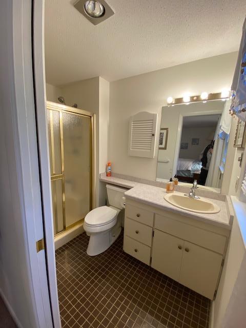 5 Barbary Circle Mashpee, MA 02649 - Photo 18 of 24 a bathroom with a toilet sink and mirror