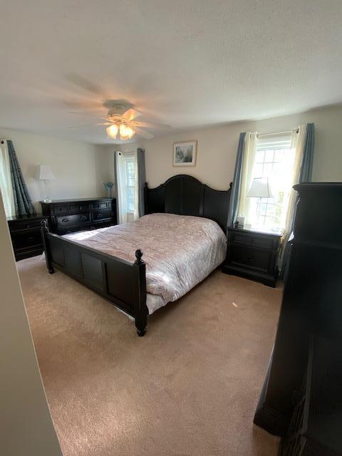 5 Barbary Circle Mashpee, MA 02649 - Photo 22 of 24 a bedroom with a bed and window