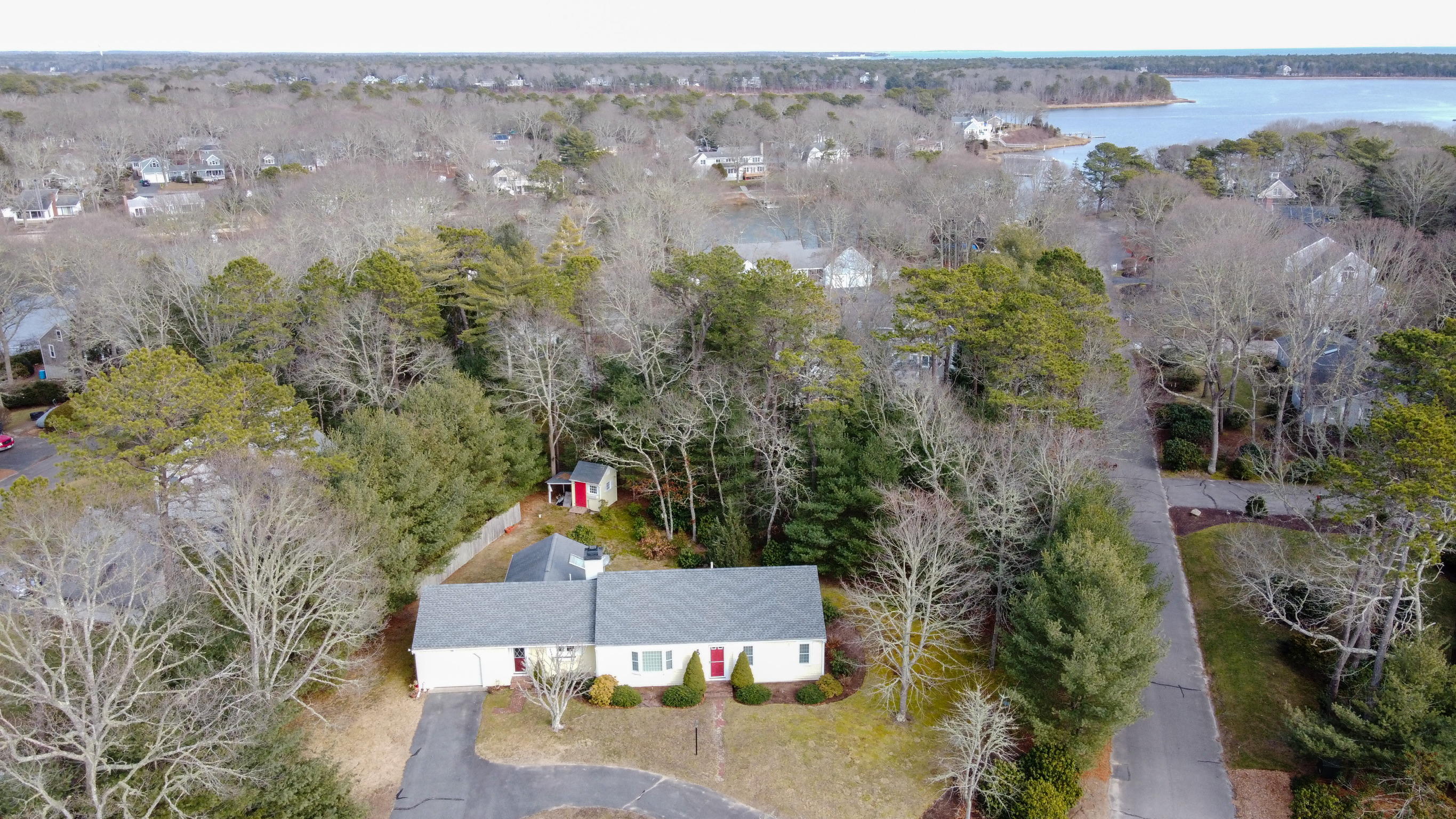 5 Barbary Circle Mashpee, MA 02649 - Photo 3 of 24 an aerial view of a house with a yard