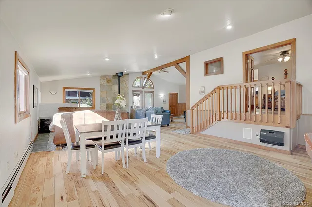 a living room with furniture and a table