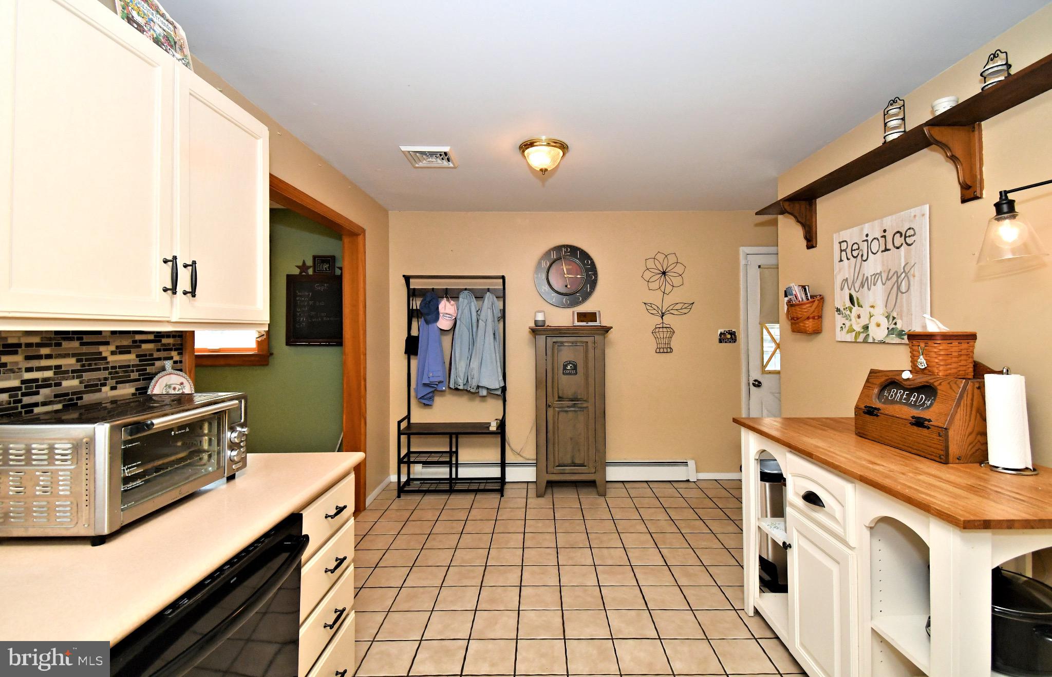 336 Arch Street Spring City, PA 19475 - Photo 12 of 58 a kitchen with stainless steel appliances a stove a sink and a refrigerator