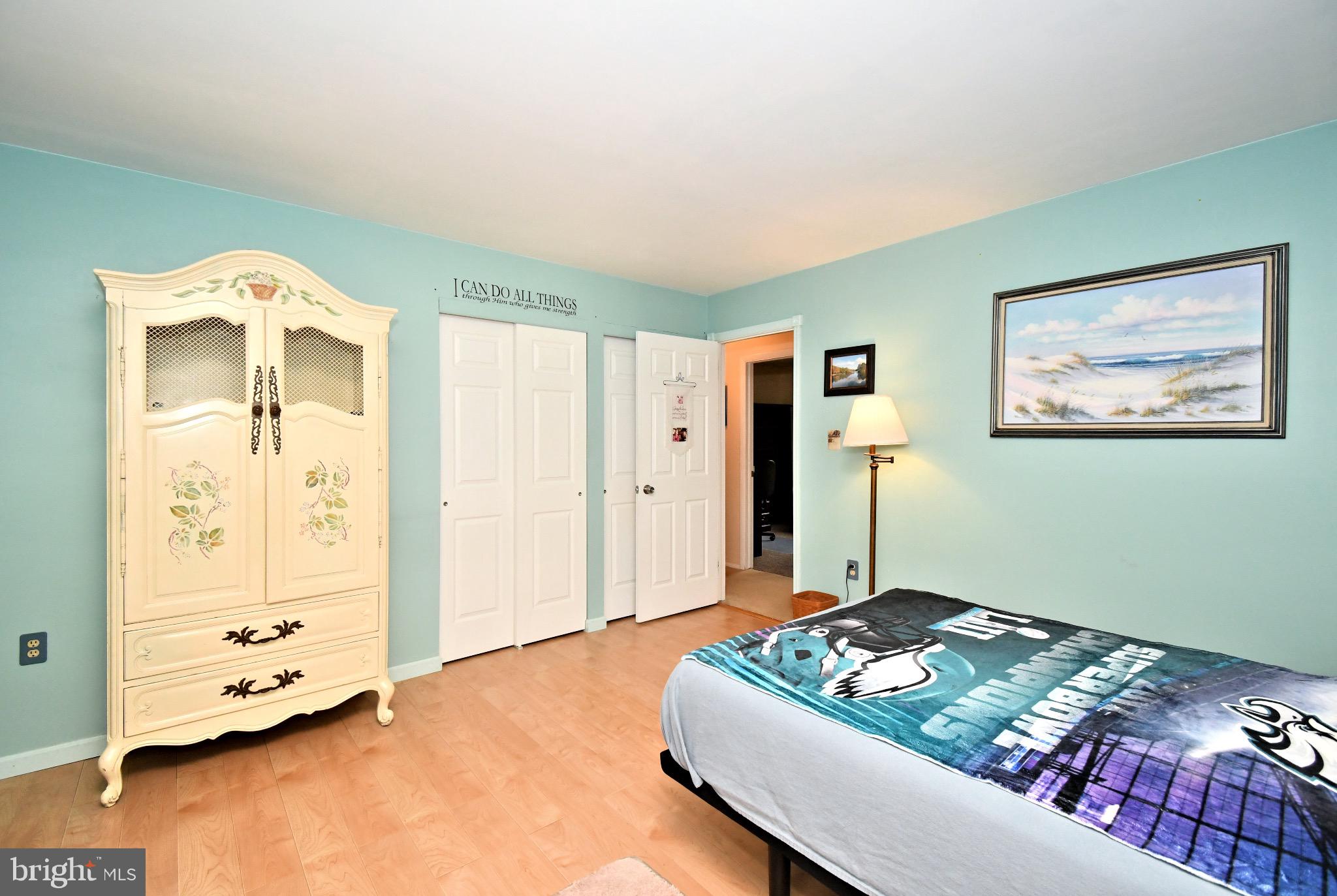 336 Arch Street Spring City, PA 19475 - Photo 24 of 58 a bedroom with a bed and wooden floor