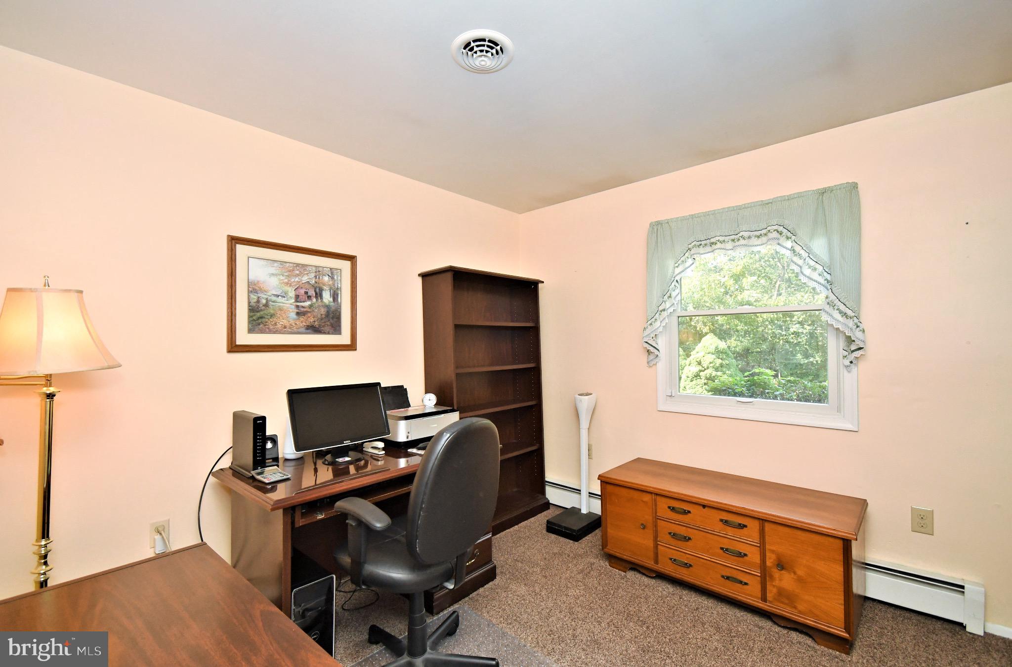 336 Arch Street Spring City, PA 19475 - Photo 29 of 58 a view of a workspace with furniture and a window