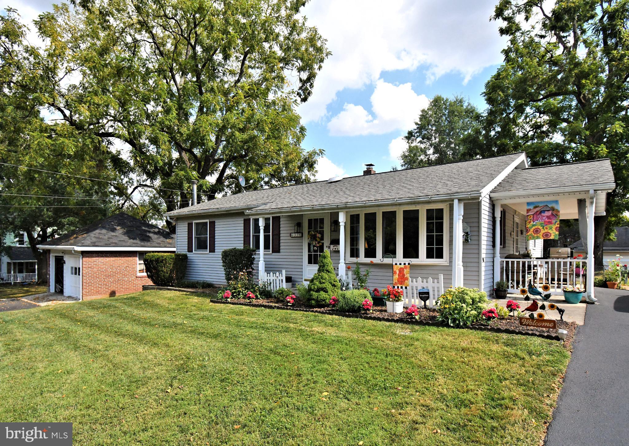 336 Arch Street Spring City, PA 19475 - Photo 3 of 58 a front view of house with yard and outdoor seating