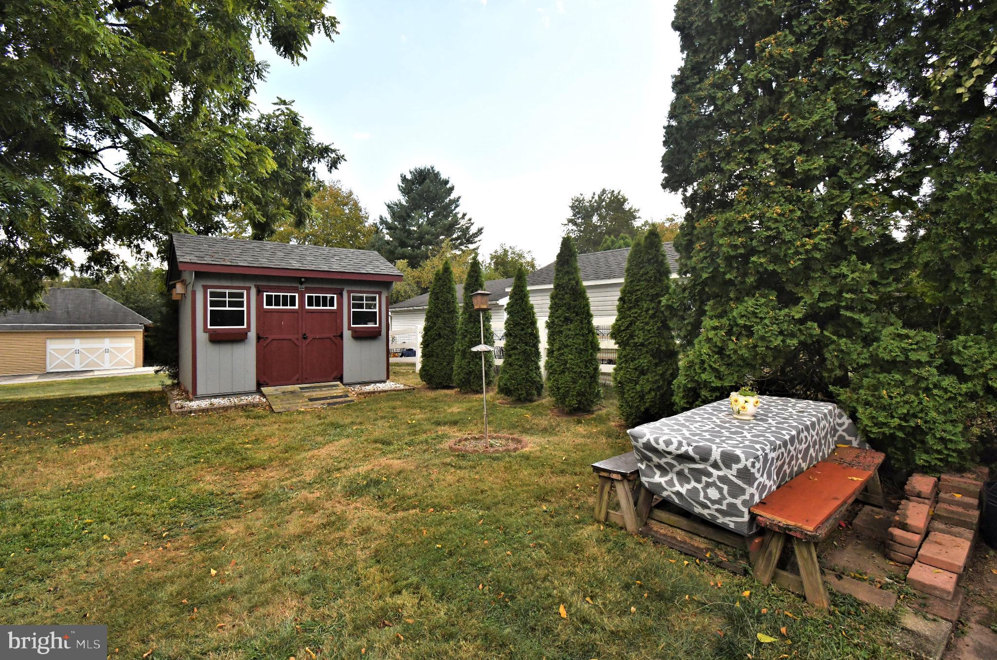 336 Arch Street Spring City, PA 19475 - Photo 47 of 58 a backyard of a house with yard and outdoor seating