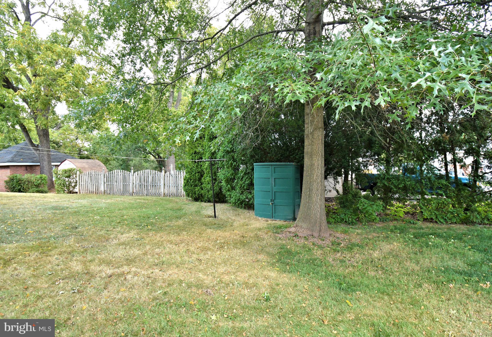 336 Arch Street Spring City, PA 19475 - Photo 55 of 58 a backyard of a house with lots of green space and fountain