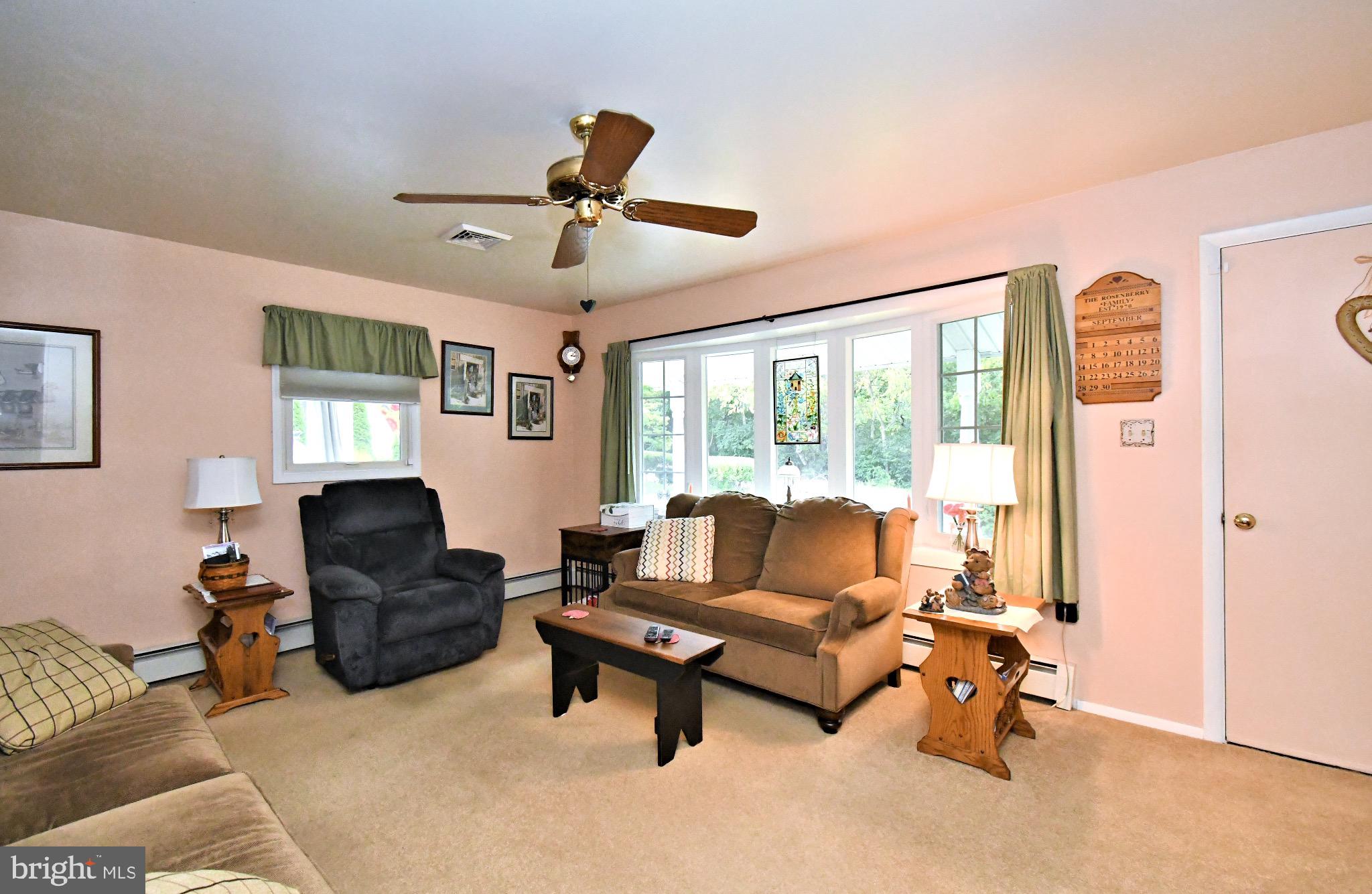 336 Arch Street Spring City, PA 19475 - Photo 7 of 58 a living room with furniture and a large window