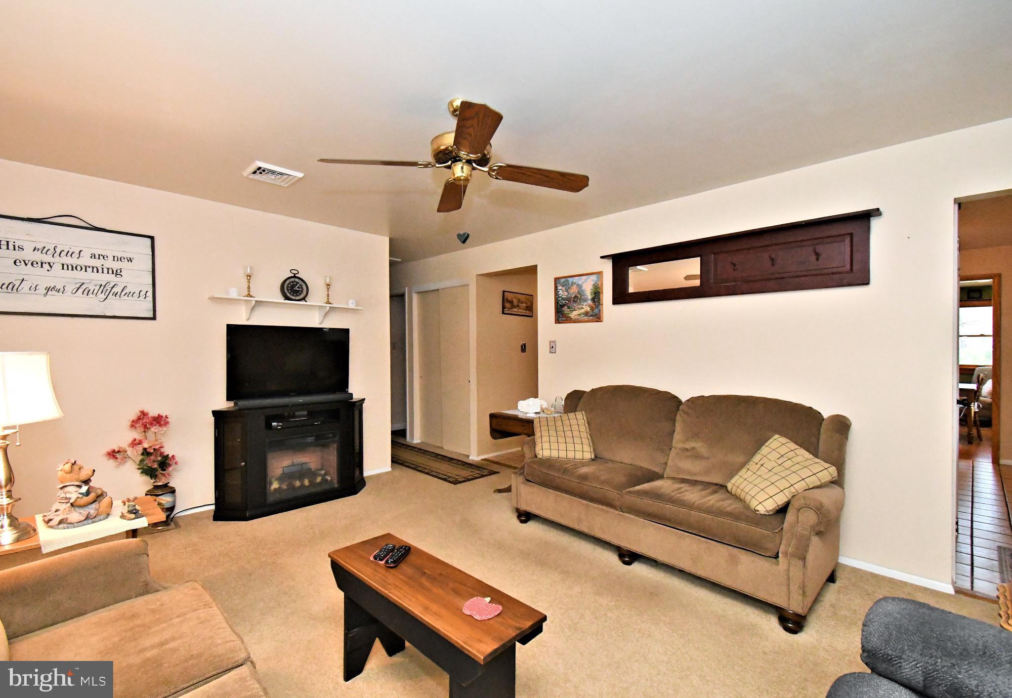 336 Arch Street Spring City, PA 19475 - Photo 9 of 58 a living room with furniture and a flat screen tv