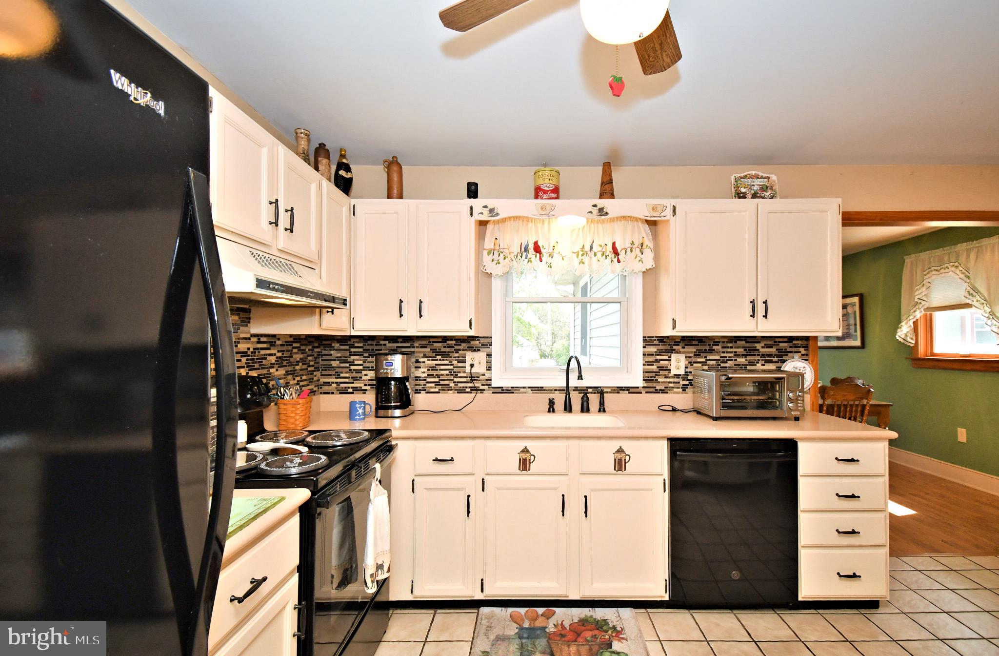 336 Arch Street Spring City, PA 19475 - Photo 10 of 58 a kitchen with a stove a sink and a refrigerator