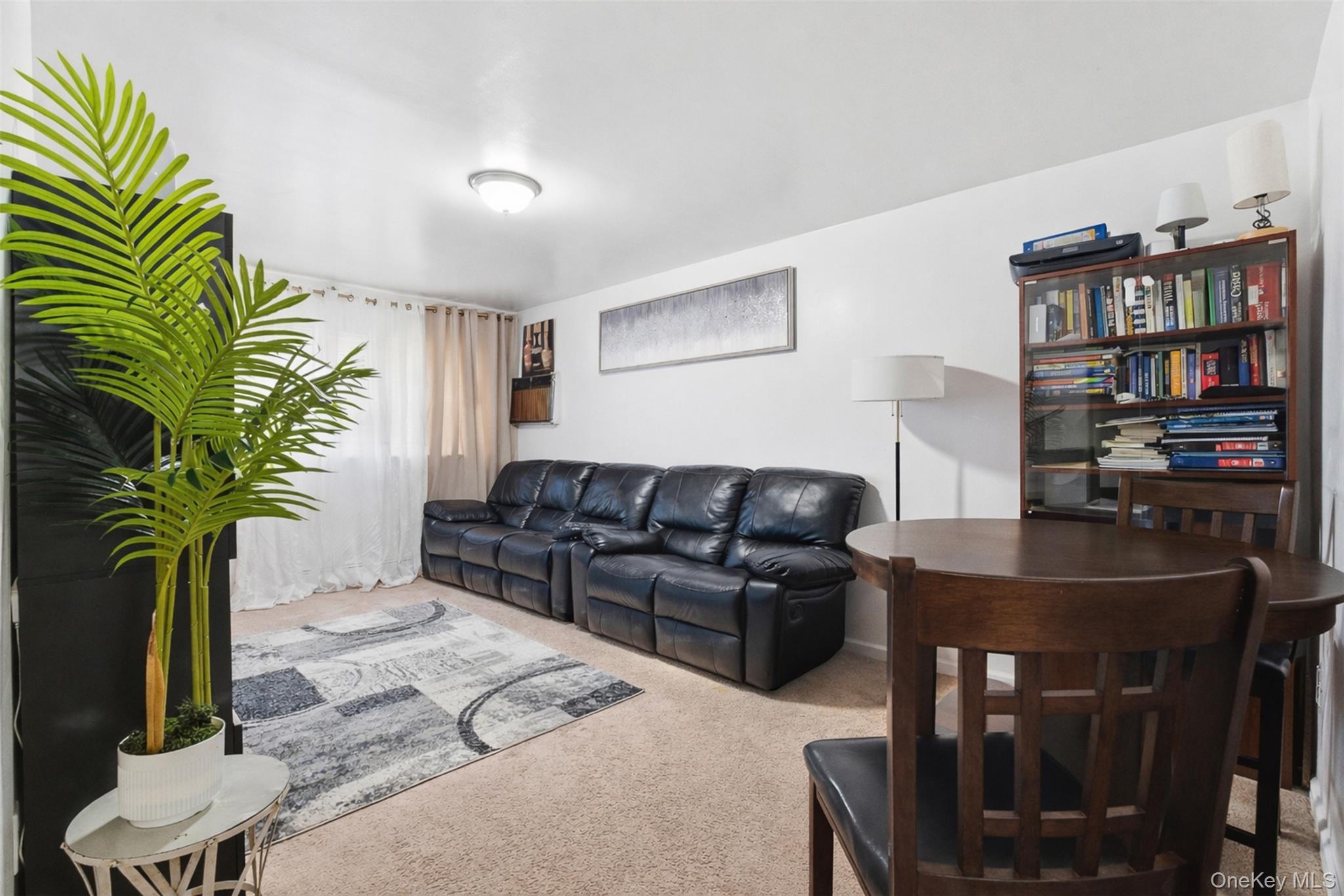 1677 Unionport Road Bronx, NY 10460 - Photo 17 of 33 View of carpeted living area