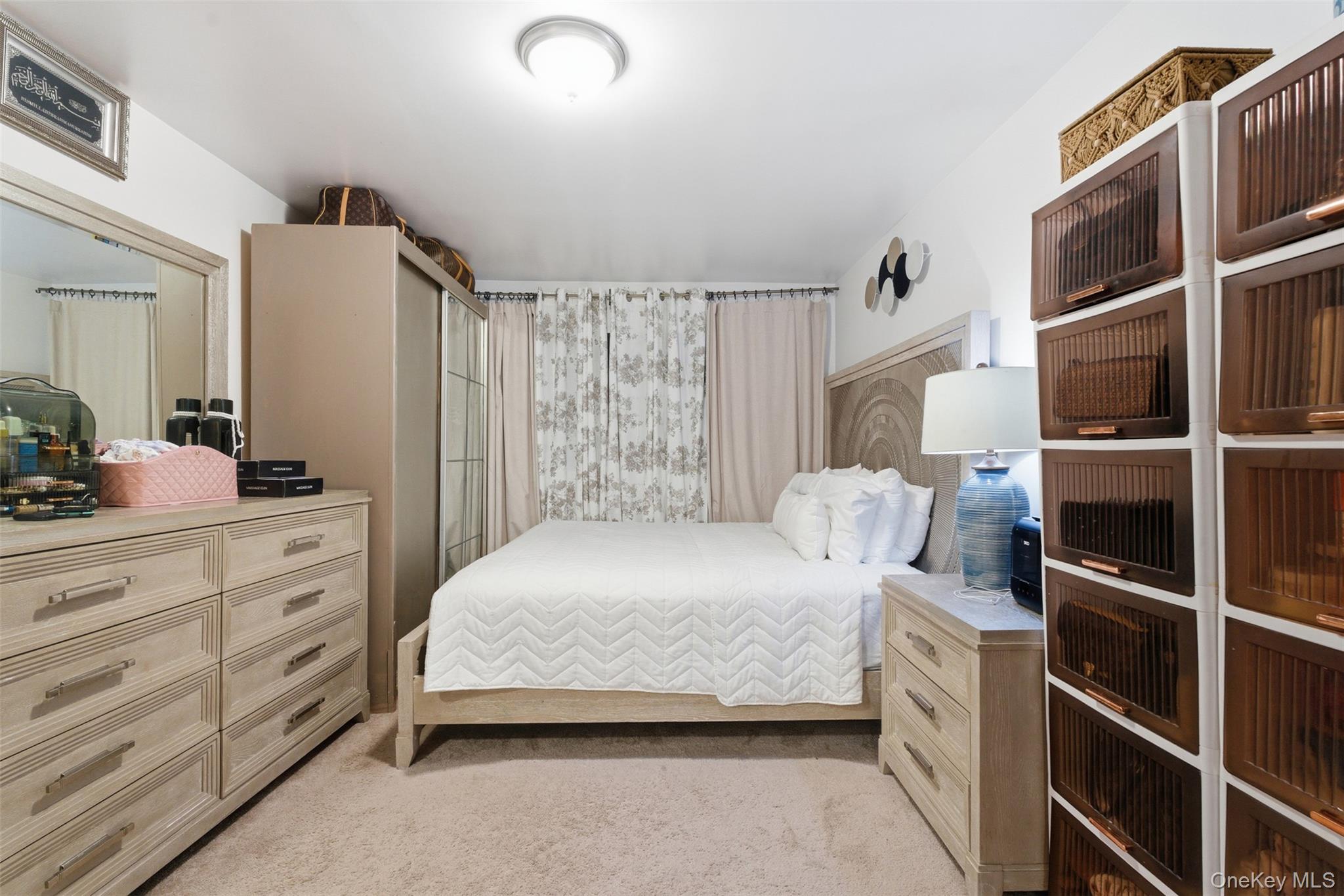 1677 Unionport Road Bronx, NY 10460 - Photo 20 of 33 Bedroom with light carpet