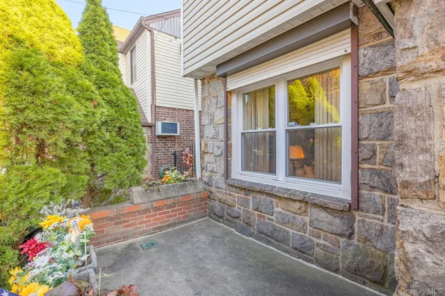 a view of house with backyard