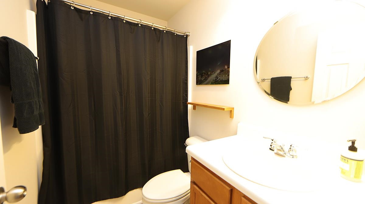 7020 Racine Way Raleigh, NC 27690 - Photo 21 of 26 Conveniently situated next to the additional 2 Bedrooms. 2nd Full Bath