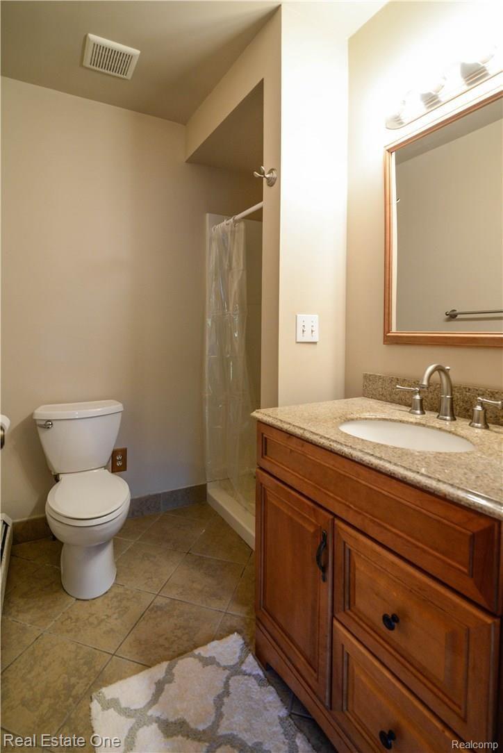 8363 McClements Road Brighton, MI 48114 - Photo 33 of 38 Master Bathroom