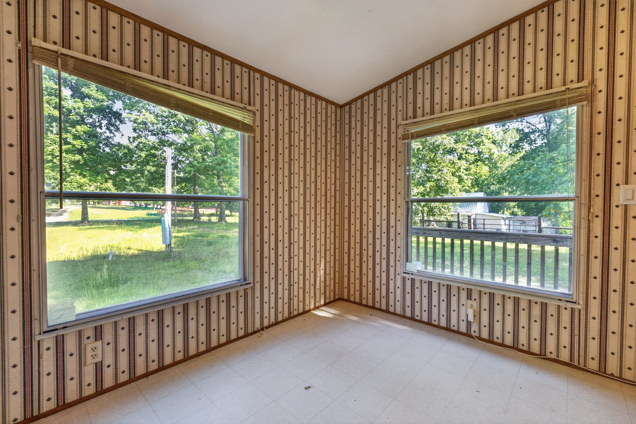 228 Shasteen Ridge Road Lynchburg, TN 37352 - Photo 23 of 53 a view of a porch with wooden floor and outdoor space