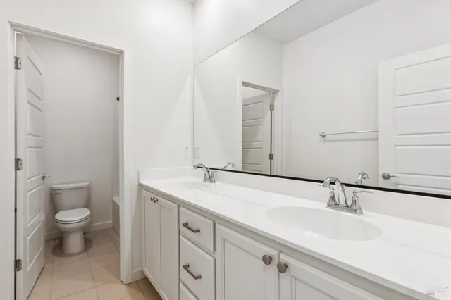 a bathroom with a sink and a toilet