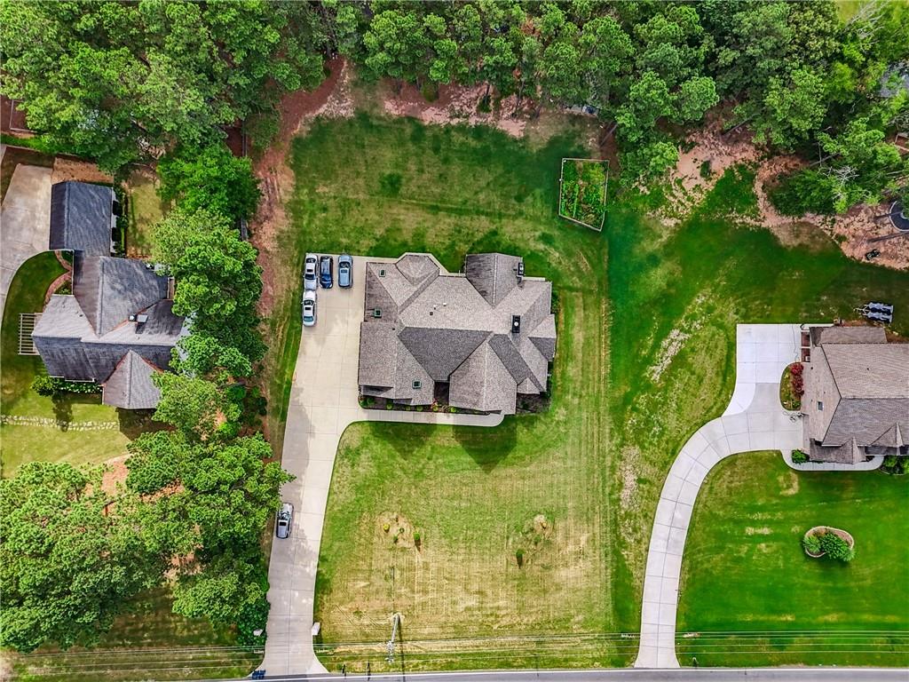 852 Tom Miller Road Bethlehem, GA 30620 - Photo 66 of 68 an aerial view of residential house with an outdoor space and seating