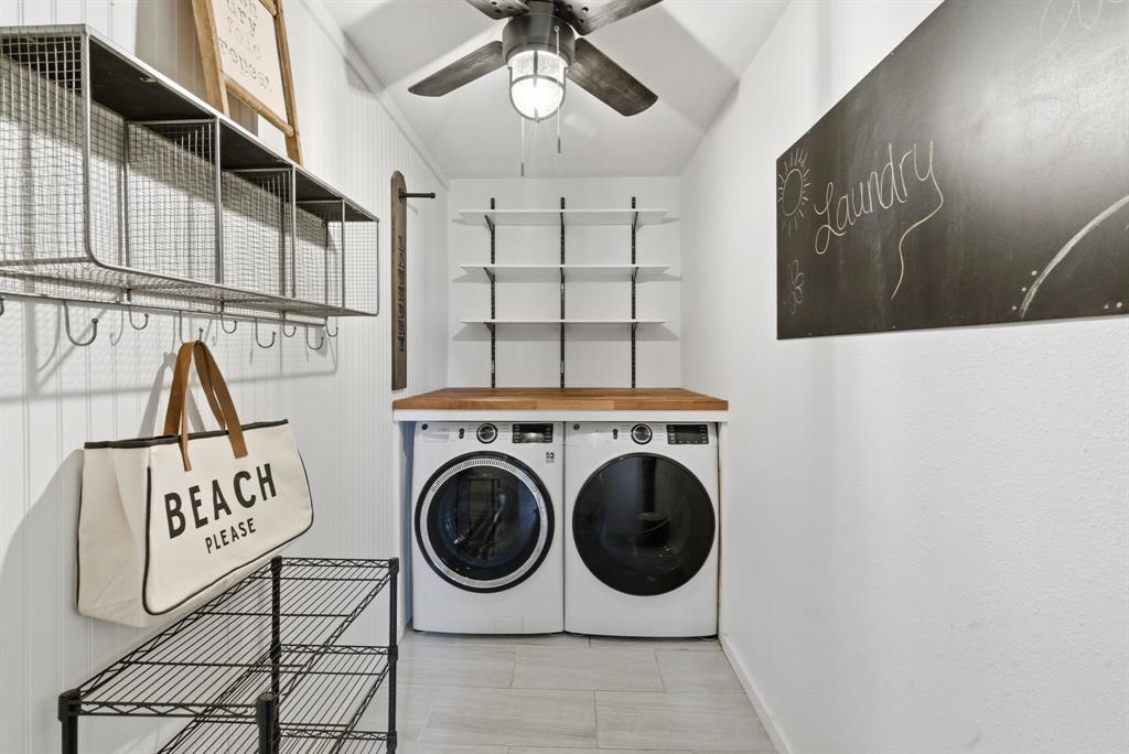 5206 Wedgefield Road Granbury, TX 76049 - Photo 13 of 39 a view of a hallway with washer and dryer