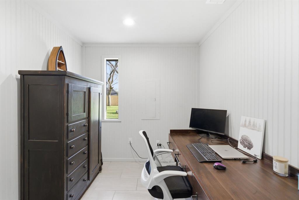 5206 Wedgefield Road Granbury, TX 76049 - Photo 14 of 39 a workspace with furniture and wooden floor