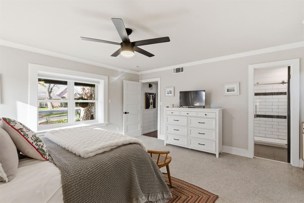 5206 Wedgefield Road Granbury, TX 76049 - Photo 17 of 39 a bedroom with a bed and a window