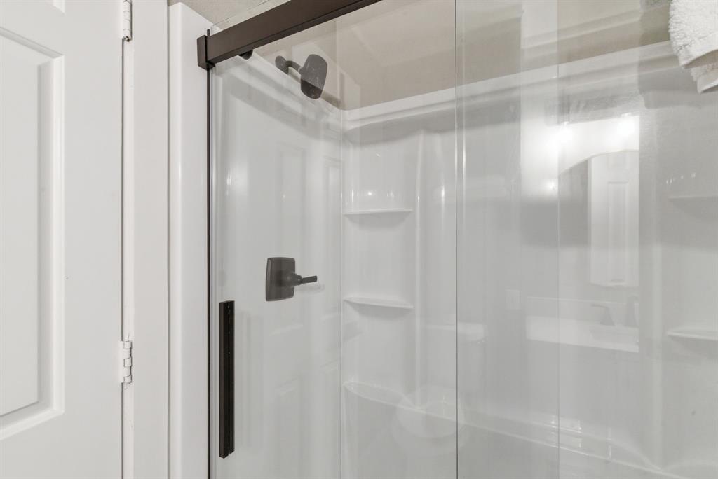 5206 Wedgefield Road Granbury, TX 76049 - Photo 26 of 39 a bathroom with a shower