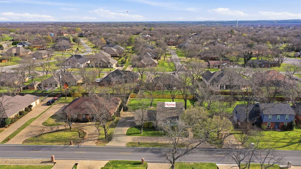 5206 Wedgefield Road Granbury, TX 76049 - Photo 36 of 39 an aerial view of residential houses with outdoor space