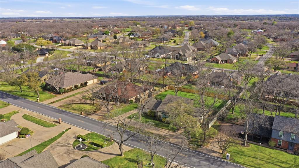 5206 Wedgefield Road Granbury, TX 76049 - Photo 37 of 39 an aerial view of residential houses with outdoor space