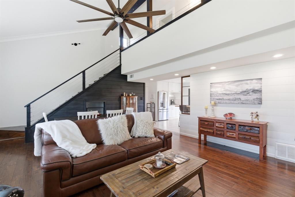 5206 Wedgefield Road Granbury, TX 76049 - Photo 5 of 39 a living room with furniture and wooden floor